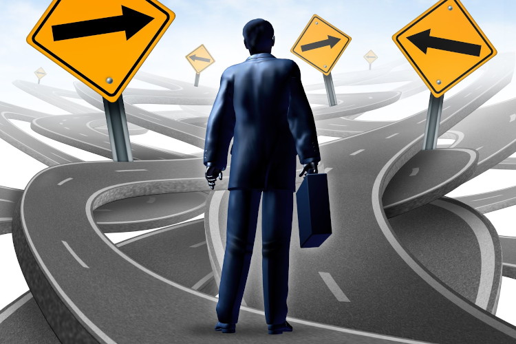 15845975 - strategic journey as a business man with a breifcase choosing the right strategic path for a new career with blank yellow traffic signs with arrows tangled roads and highways in a confused direction