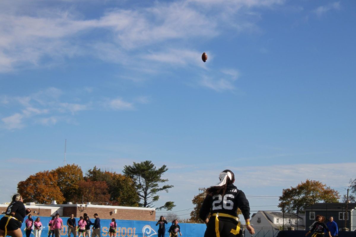 A senior runs for the ball.