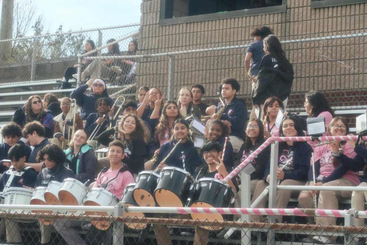 Lodi High School's band poses for a photo and plays on!