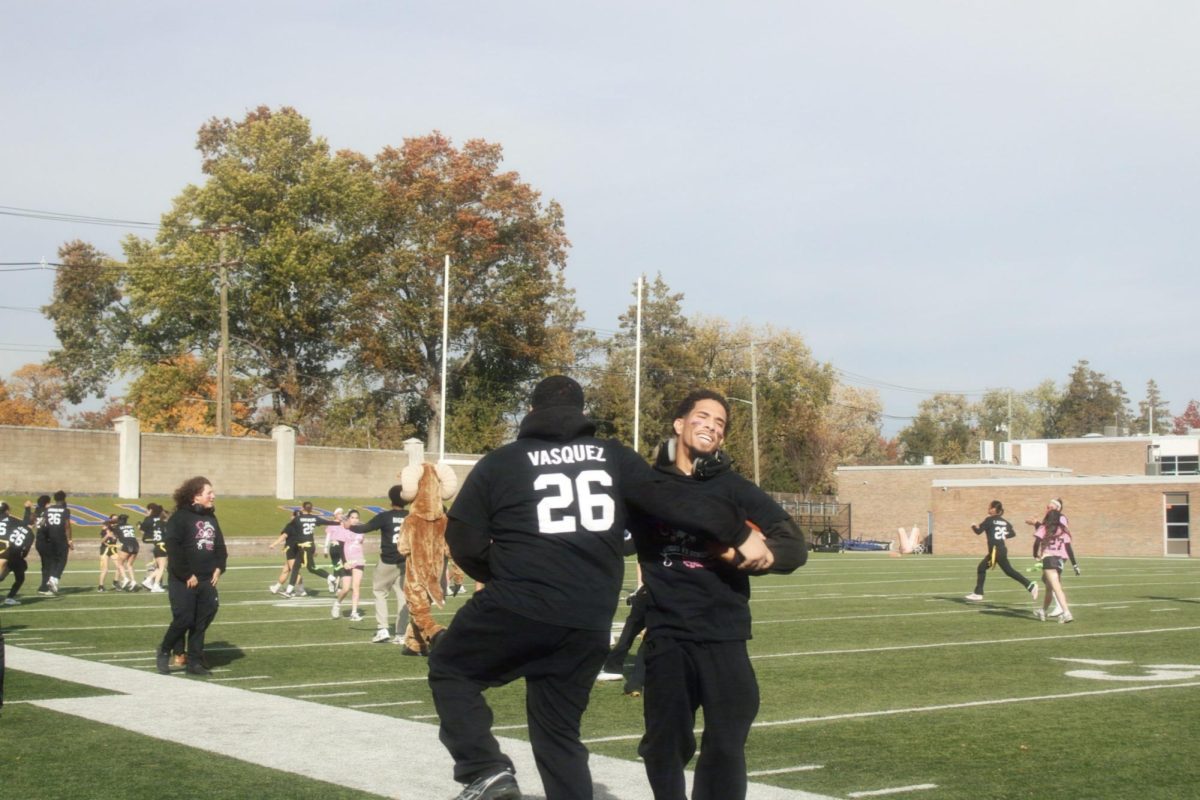 seniors, Joshua and Aiden, celebrate powder puff. 