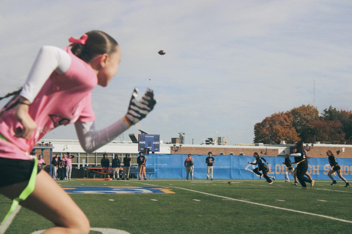 Junior, Faith, runs after the ball. 